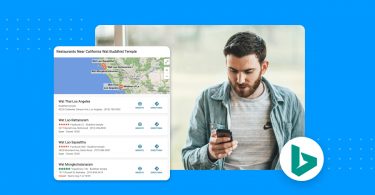 Image of a man searching Bing for restaurants in California