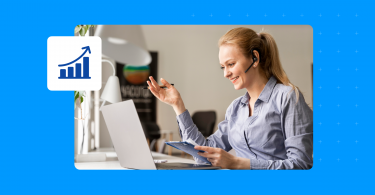 Business women on her laptop enjoying the benefits of enterprise SEO.