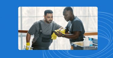 Two home services workers going discussing project plans