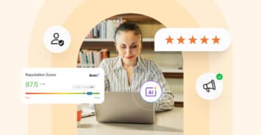 A woman looking at a laptop with an AI icon.