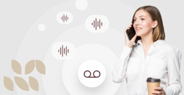 Woman listening to a professional voicemail greeting.