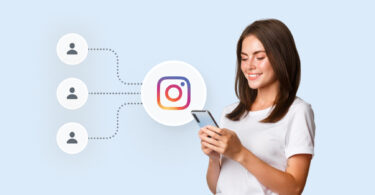 A girl tracking Instagram followers on a smartphone.