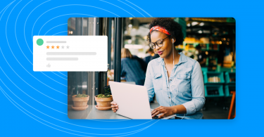 Customer reading online business reviews on her laptop.