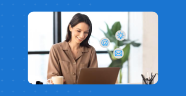 Happy business women communicating with customers using her professional email address.