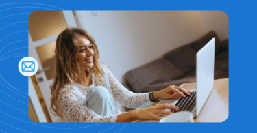 Happy business person creating an effective referral email.