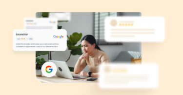 A woman looking at Google reviews on a laptop.