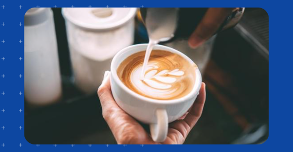 Artisan coffee being pouring into a cup.