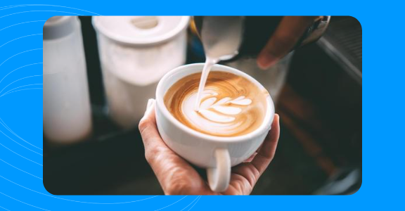 Cup of coffee being poured.