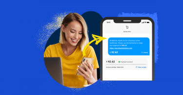 A woman on her mobile device happy that she is taking care of past due bills online