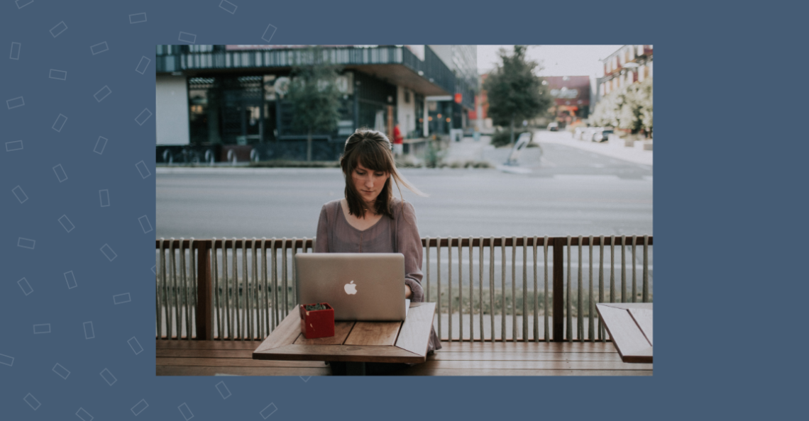 Image of a person texting using a computer