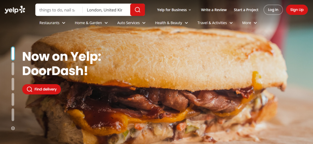 This image shows Yelp homepage banner, a close-up sandwich image promoting DoorDash food delivery
