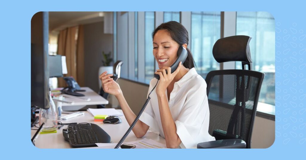 Woman listening to a voicemail greeting