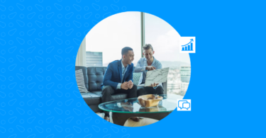 Photo shows customers and business owner interacting closely for a business deal.