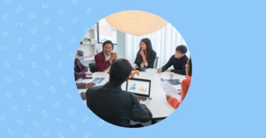Image shows a team of professionals working on the reputation of a business
