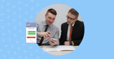 Image depicts two people discussing a review request received from a business