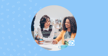 Image shows a team working together in a business